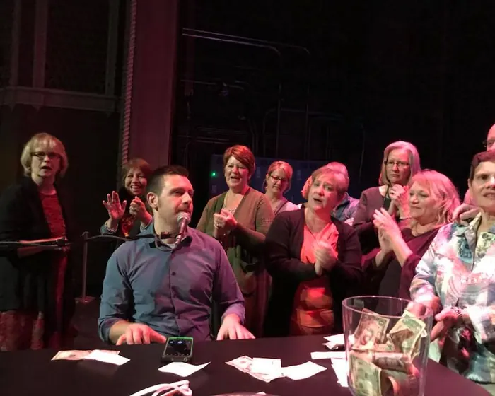 Wedding guests singing along at a Mobile Dueling Pianos show in Michigan