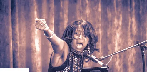 Rhonda on vocals at a dueling pianos show