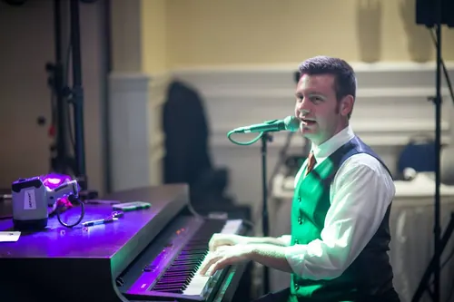 Frank performing at a Michigan wedding