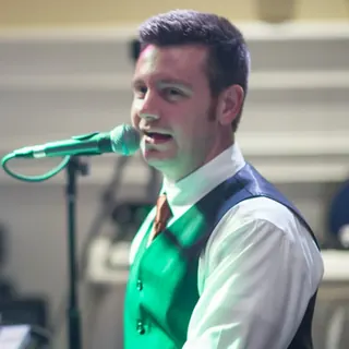 Frank, owner, player and director with Mobile Dueling Pianos