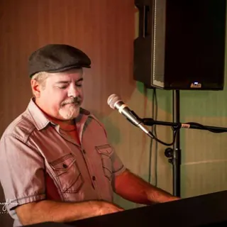 Tommy, piano player with Mobile Dueling Pianos